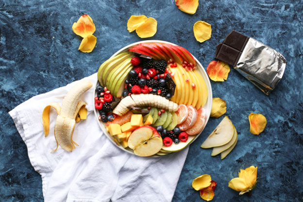 By choosing fruits to satisfy