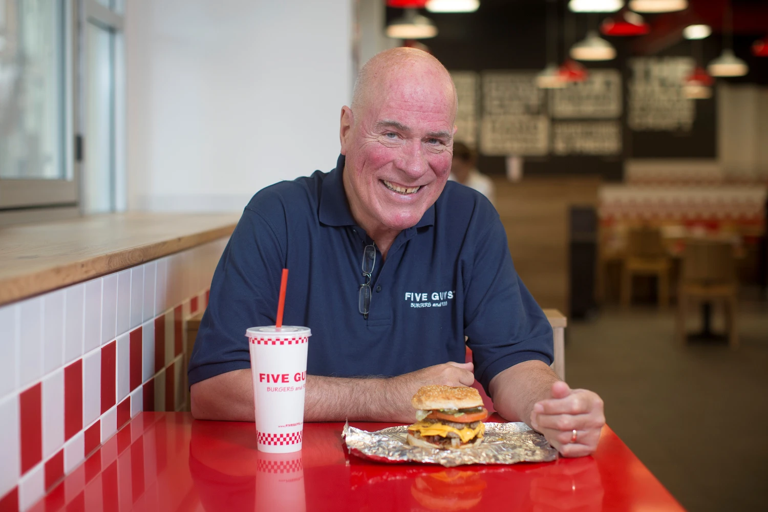 Five Guys CEO's $1.5M Bonus Reveals Fast Food Health Crisis